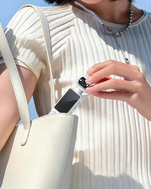  Compact and Lightweight W&O Q7 Pocket Camera Held Comfortably in Hand